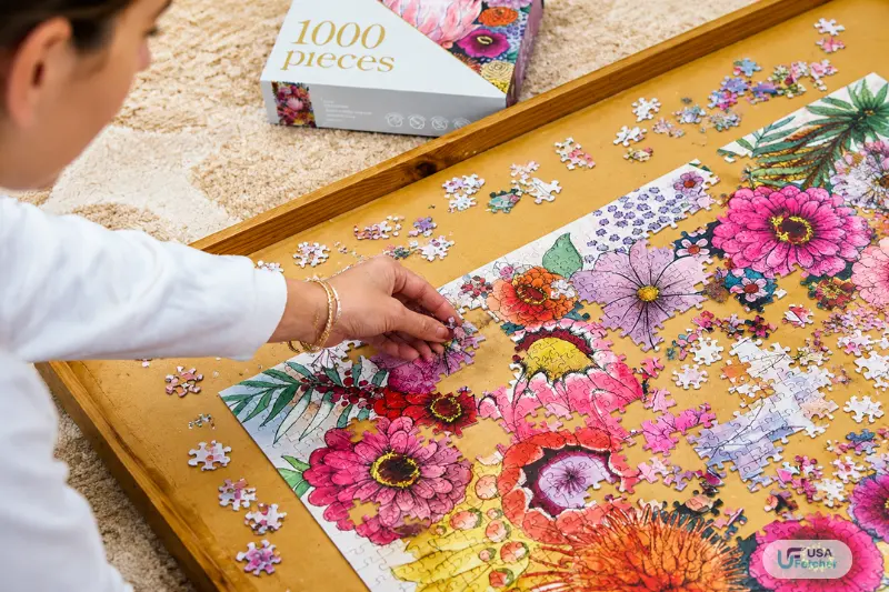 eeBoo flower puzzle pieces being assembled on a table