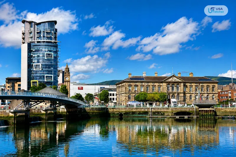 Belfast waterfront featuring the River Lagan, modern skyline, and historic architecture in Northern Ireland