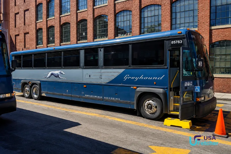 Greyhound bus parked at the Atlanta Bus Station boarding area for intercity passenger service