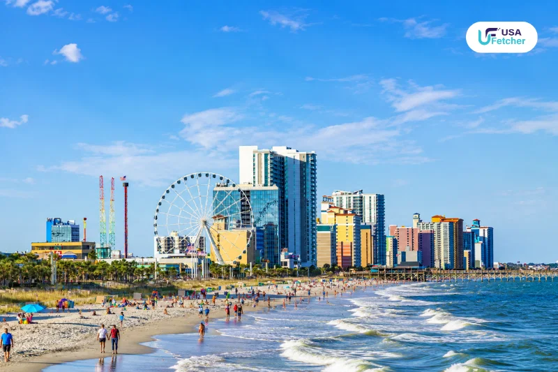 Myrtle Beach shoreline with hotels, a Ferris wheel, and visitors enjoying the beachfront